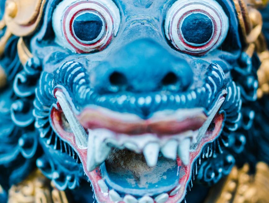 close up of a statue of barong a balinese deity